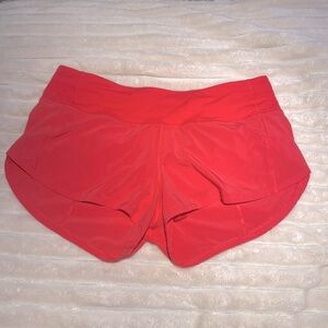 Lululemon speed up low rise short 2.5” lined reddish-pink with zipper pocket